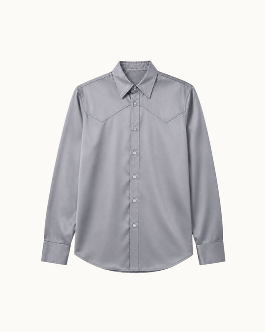 A light gray long-sleeve western-style button-up shirt with pointed collar and decorative chest stitching, shown flat against a light off-white background.